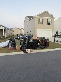 Before: curbside junk pile in front of a Myrtle Beach area home