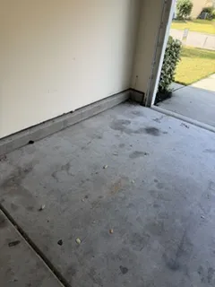 Before: garage full of junk including a hot tub cover